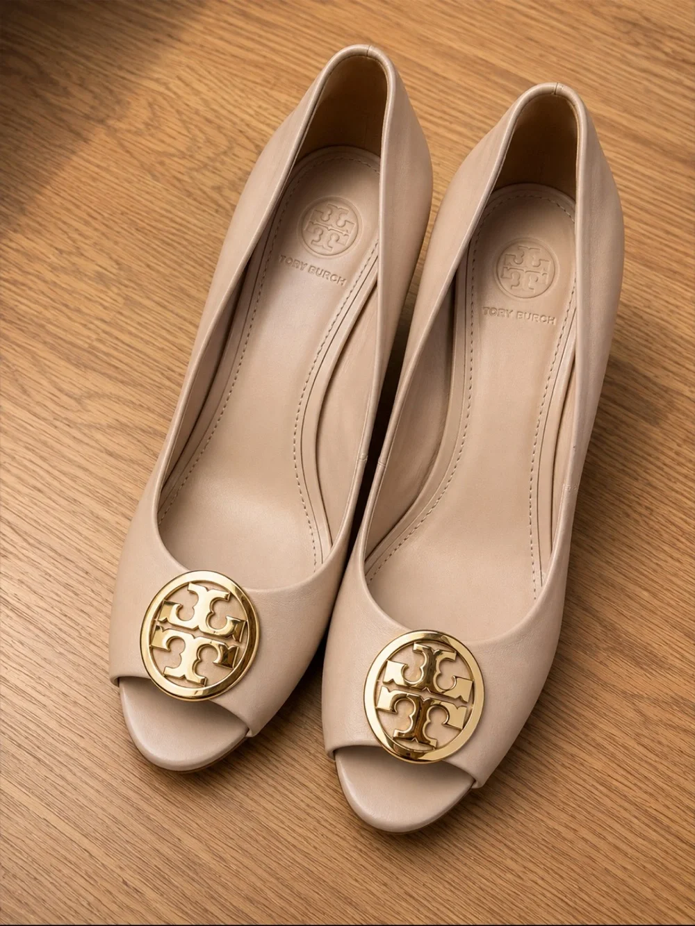 Tory Burch Nude Peep-Toe Heels with Gold Logo Medallion